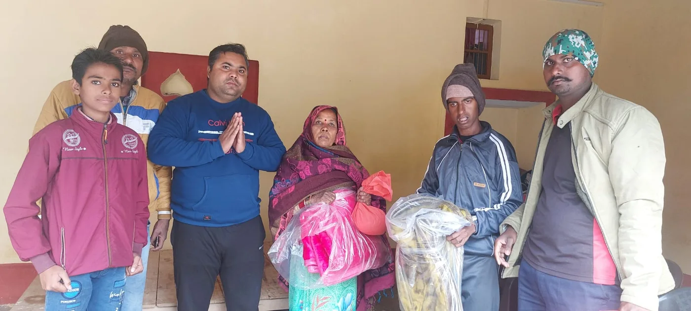 Group photograph from a community blanket distribution