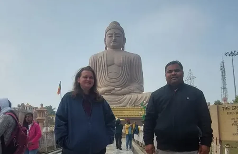 Pankaj Mishra welcoming a visitor at a Buddhist site